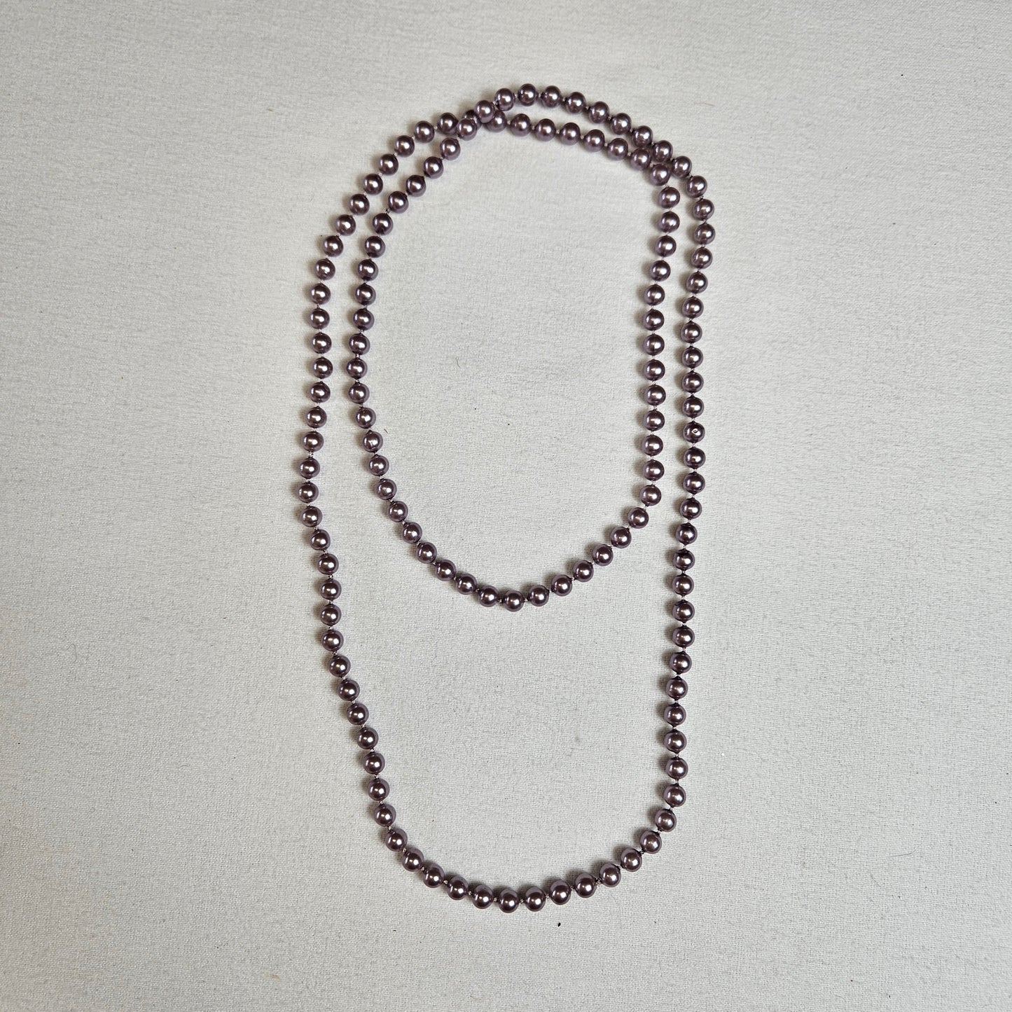 Collier de perles lilas