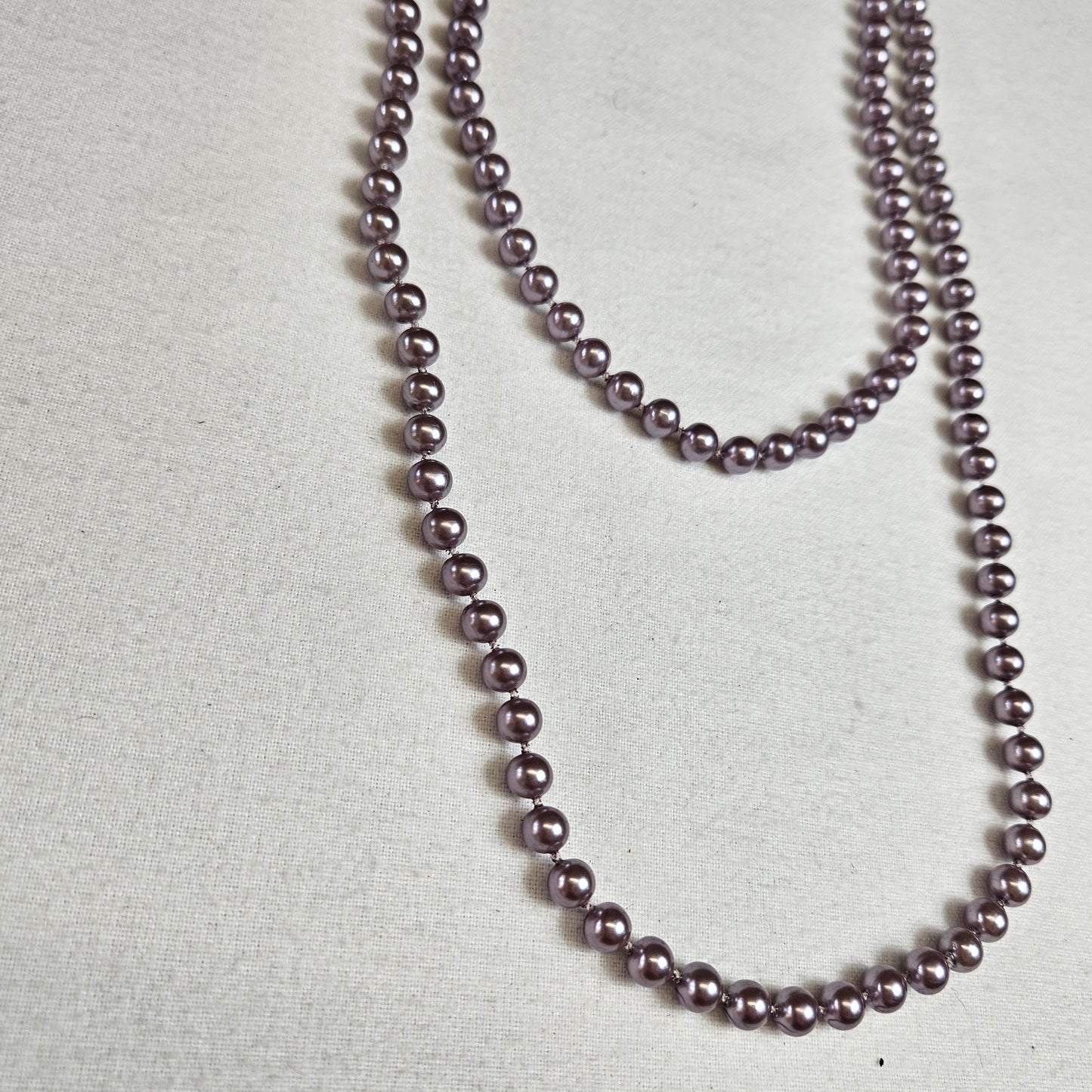 Collier de perles lilas