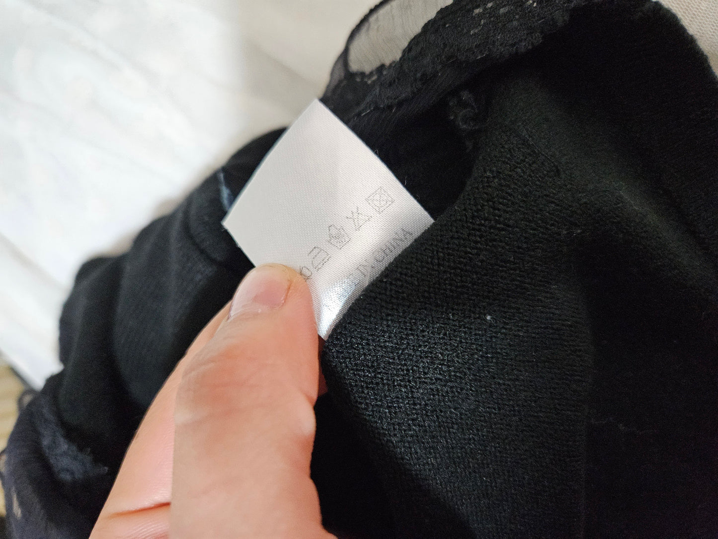 Débardeur noir détails voile et noeud