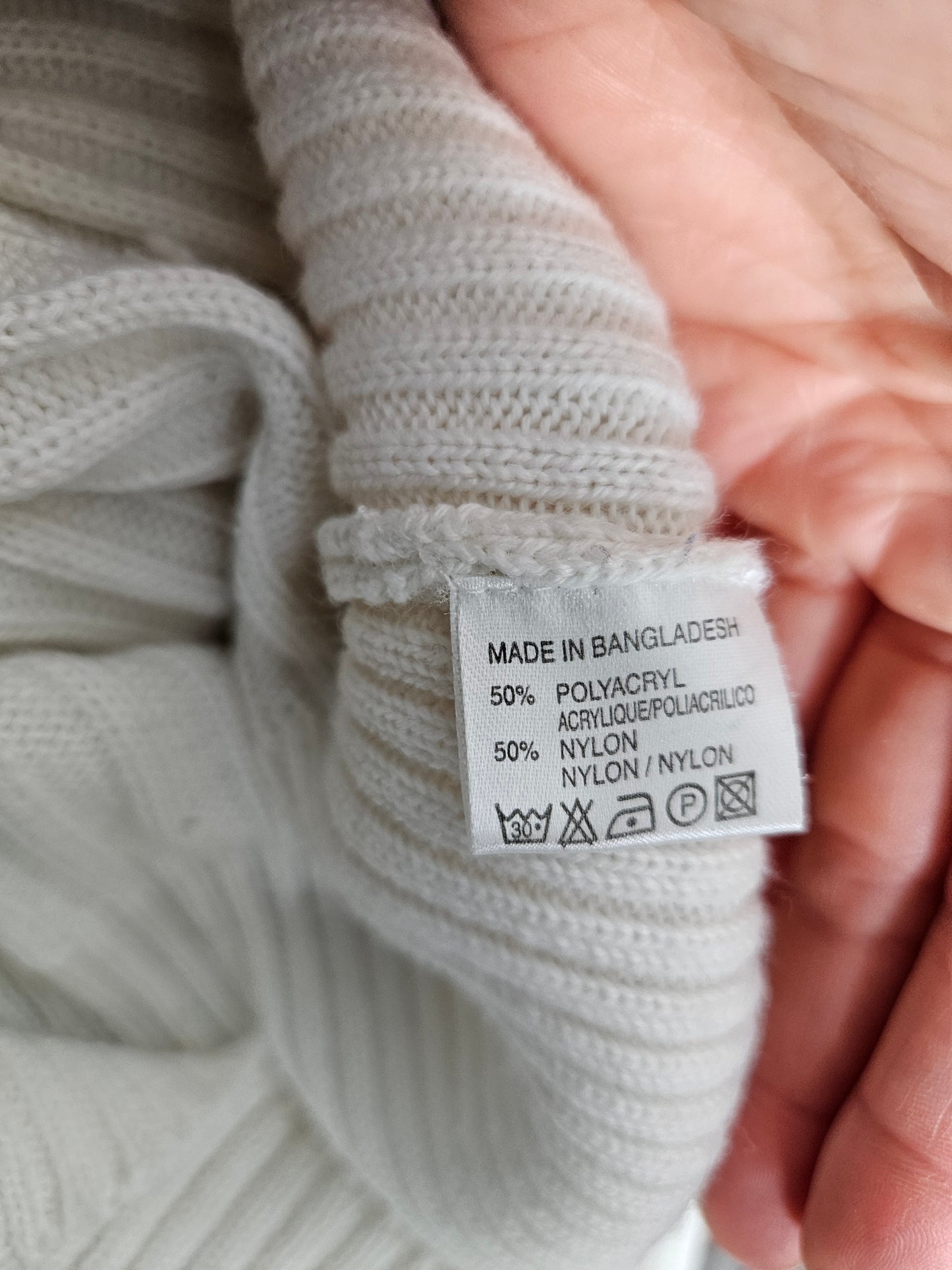 Pull col roulé à boucle