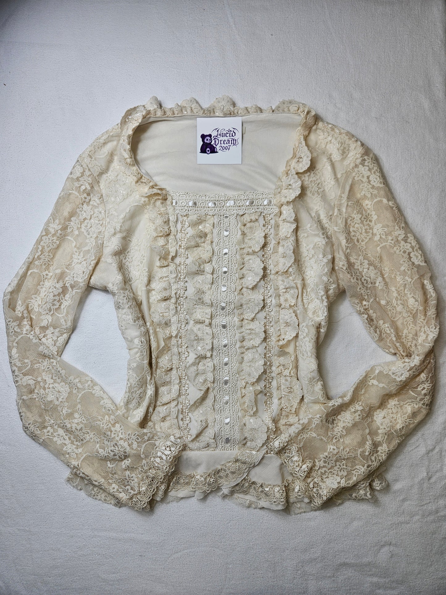 Haut en dentelle crème