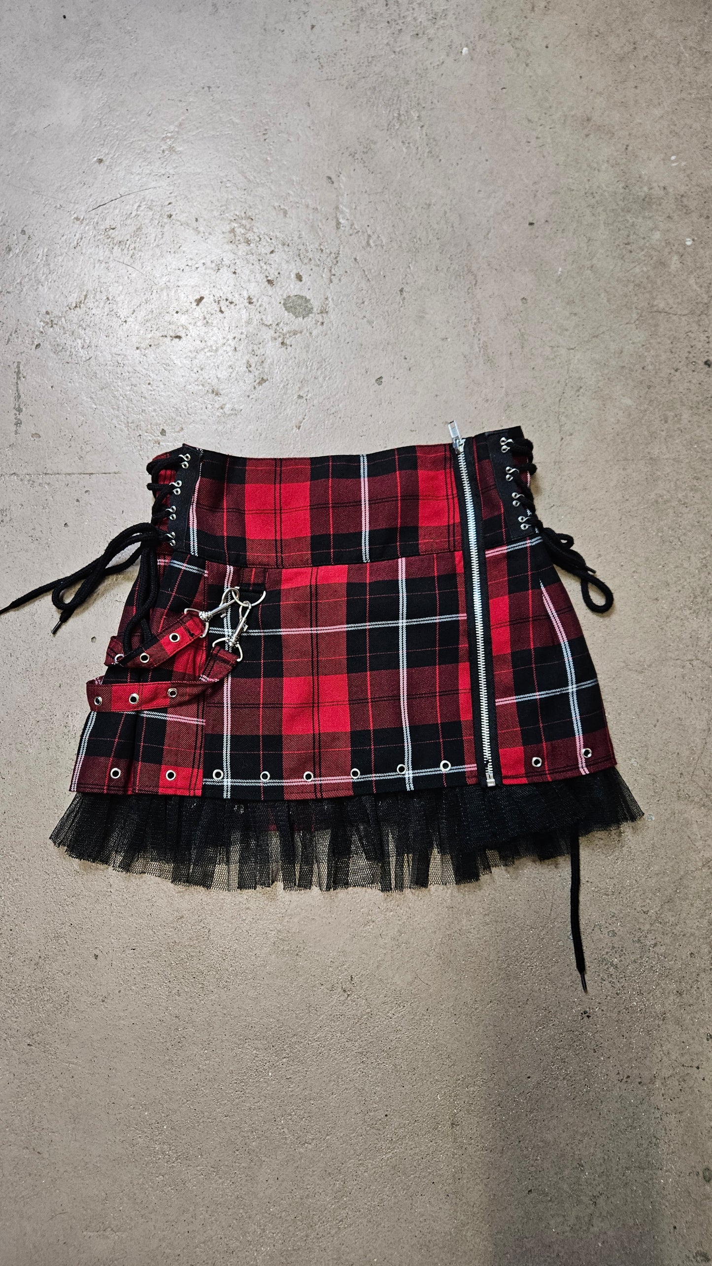 Mini jupe tartan à sangles