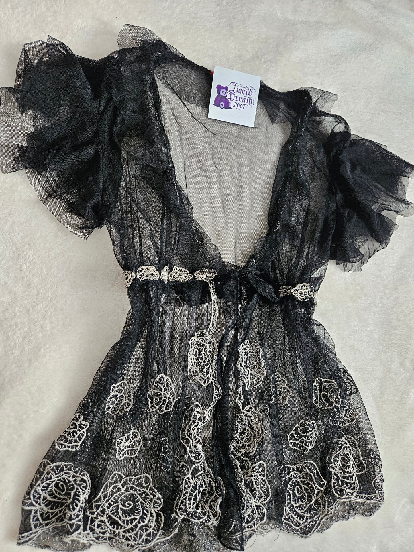 Haut en voile René Derhy