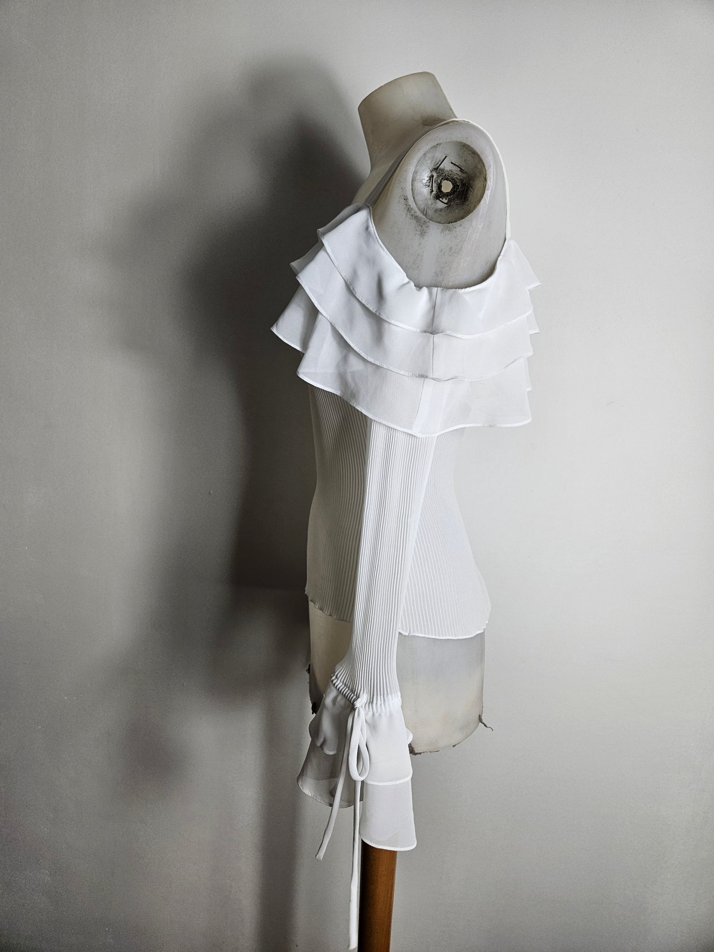 Asymmetrical voile top with ruffles
