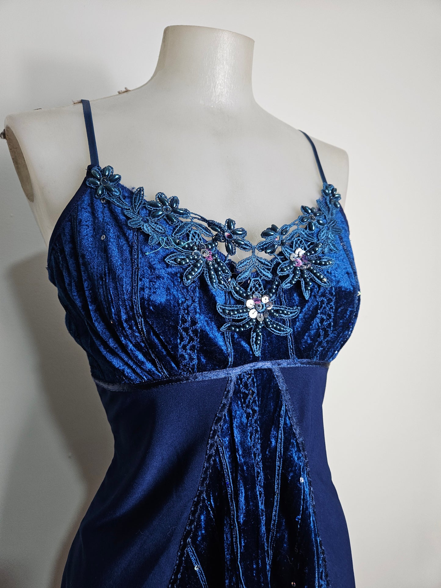 Asymmetrical top with velvet and rhinestone details