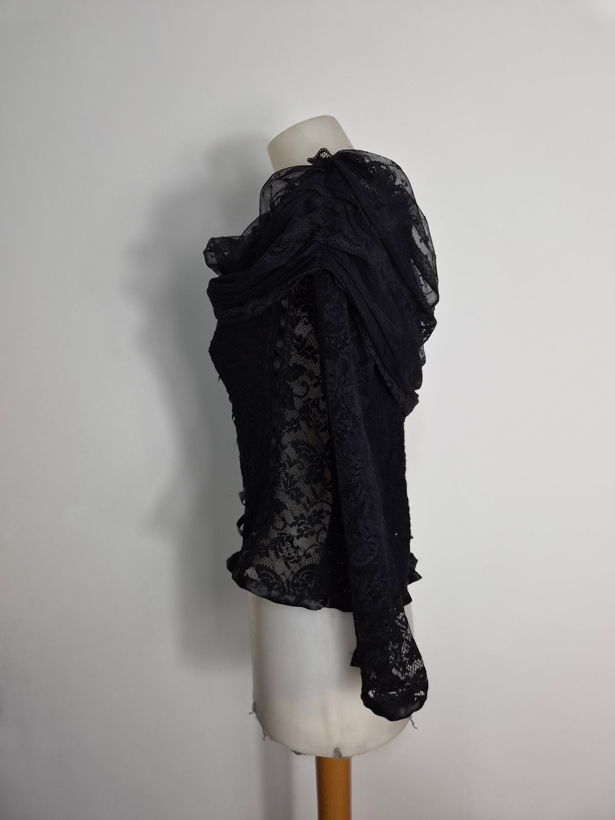 Black top with lace and floral details
