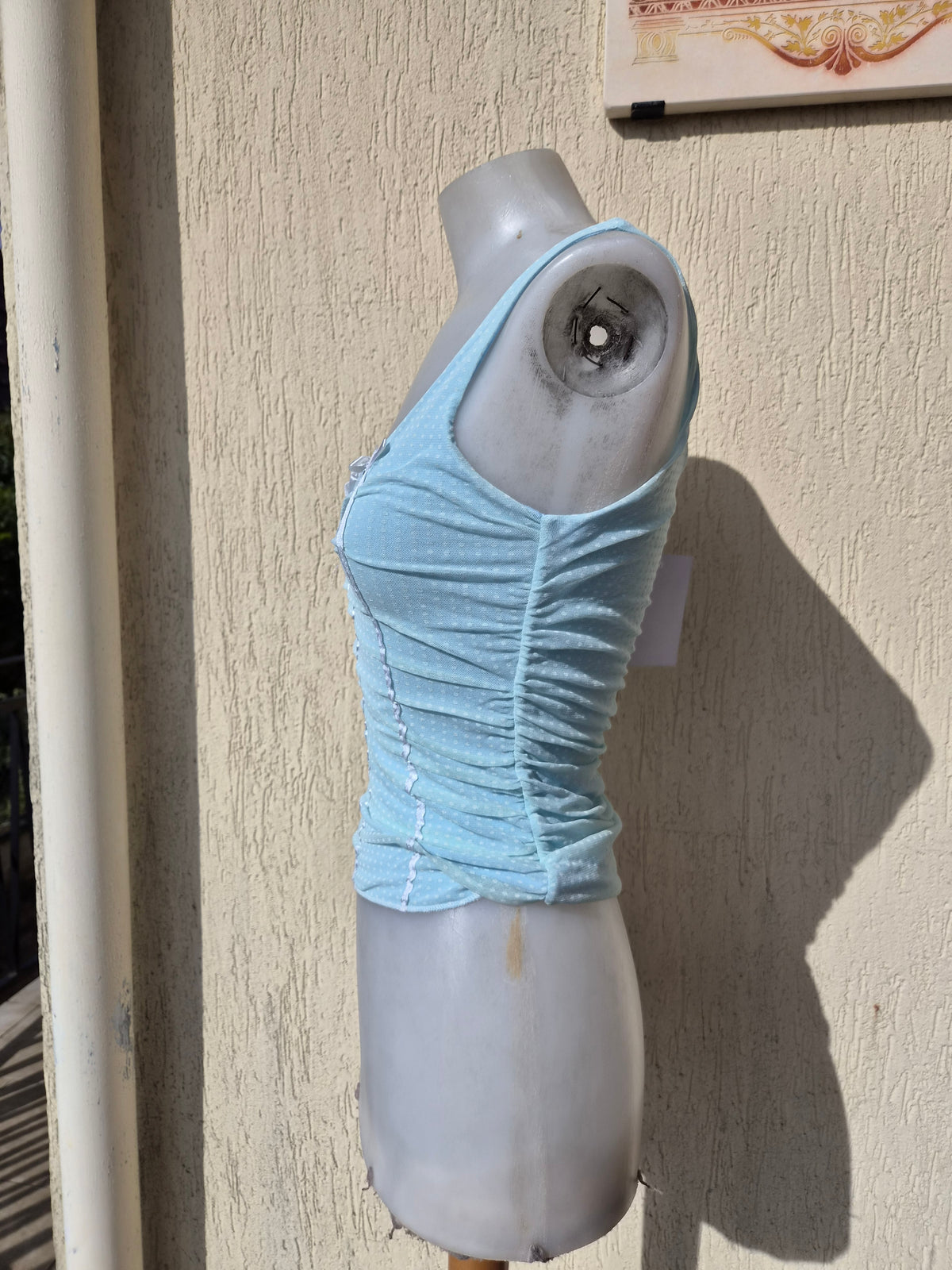 Blue pleated voile top with polka dots