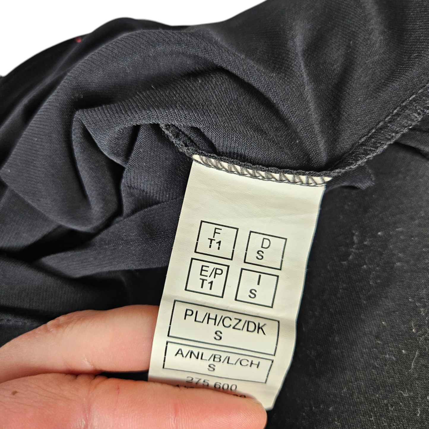 Top asymétrique à boucle