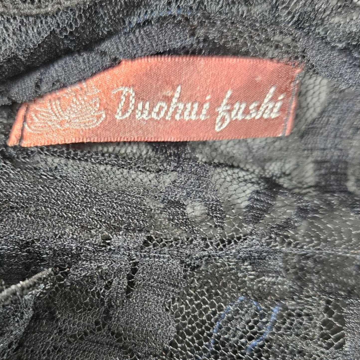 Chemisier en dentelle à volants