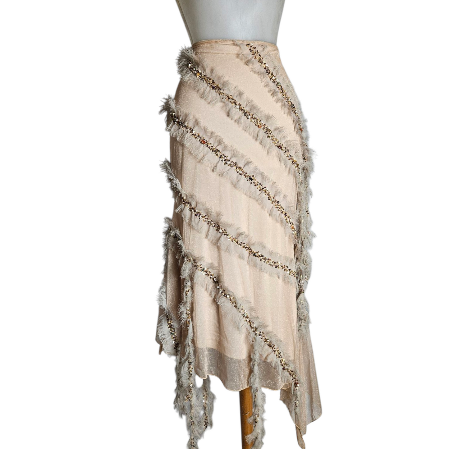 Asymmetrical skirt with feather and pearl details