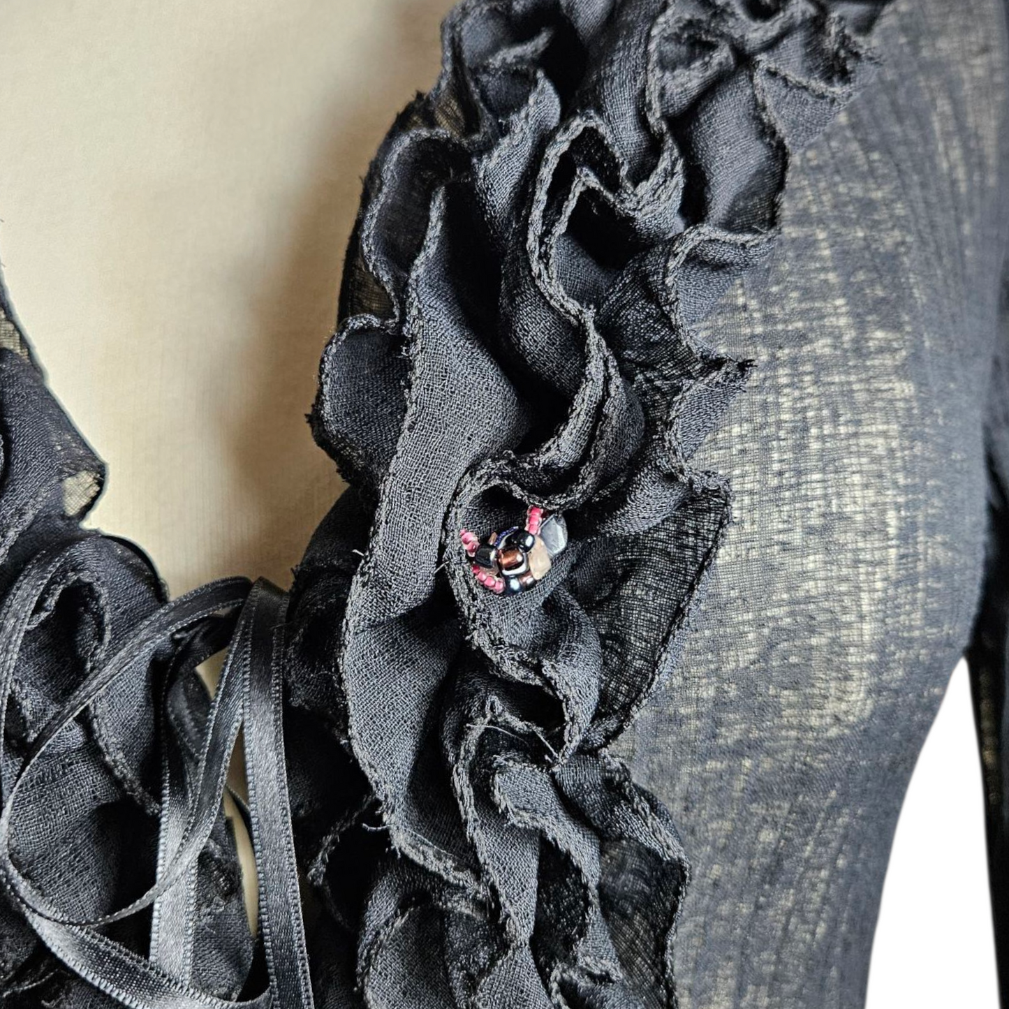 Voile blouse with ruffles and pearl details