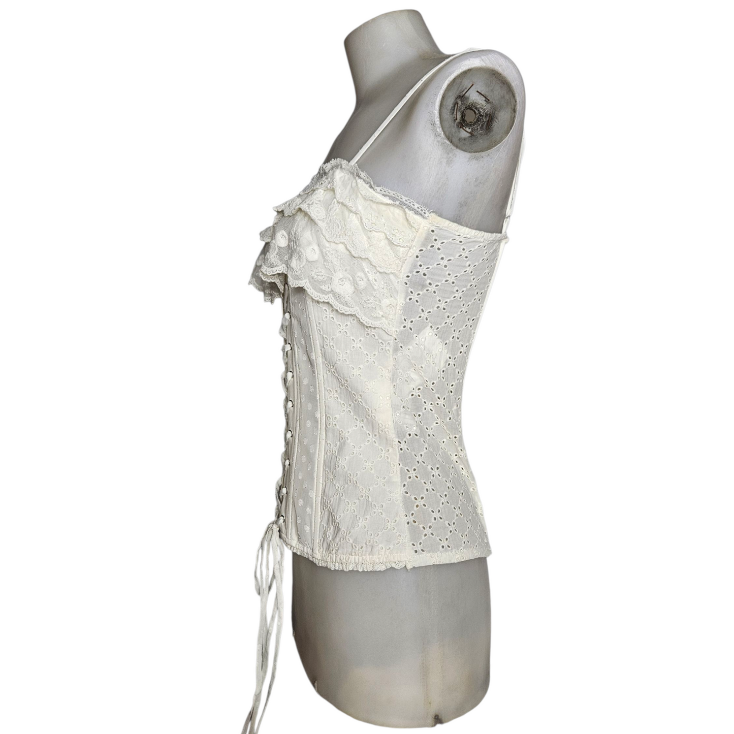 Corset-style top with lace ruffles