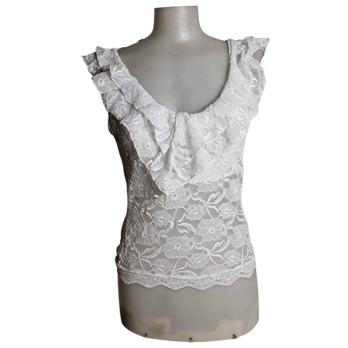Haut en dentelle blanche à volants