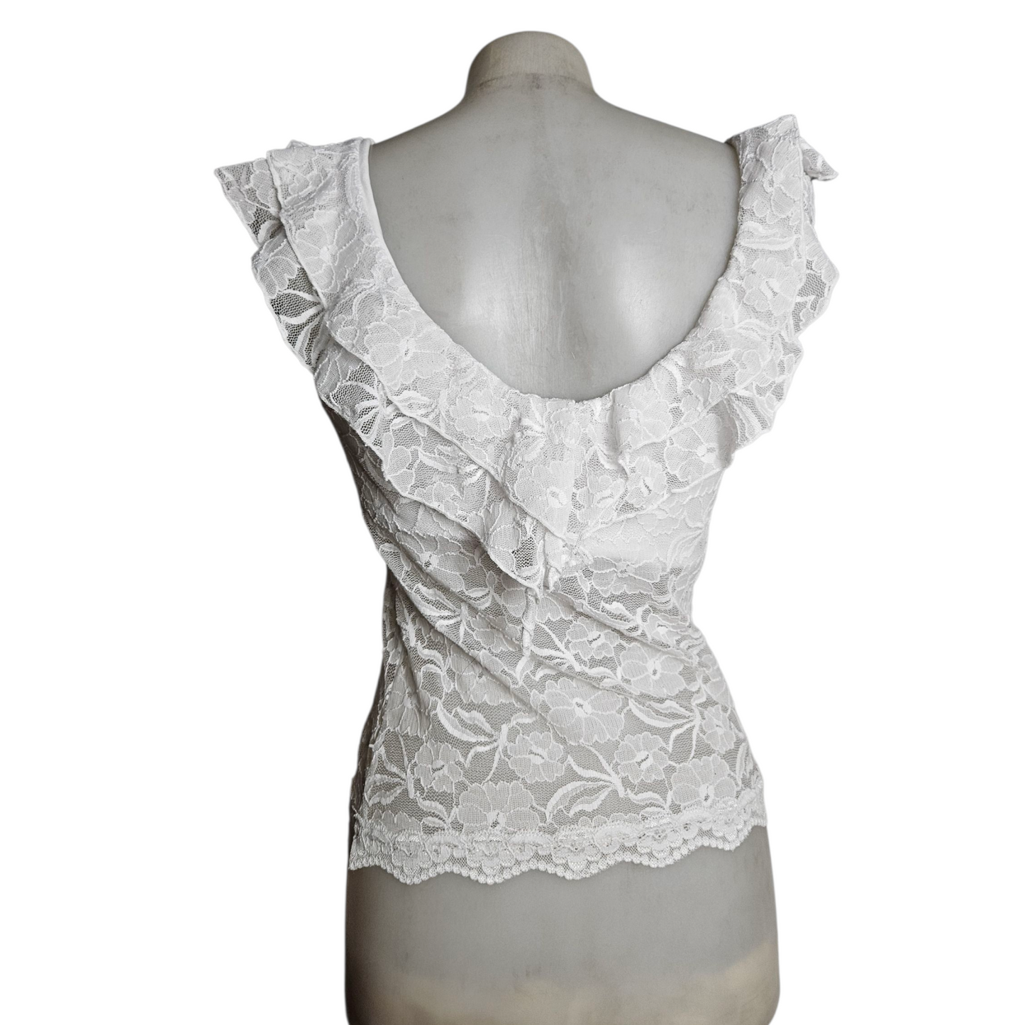 Haut en dentelle blanche à volants