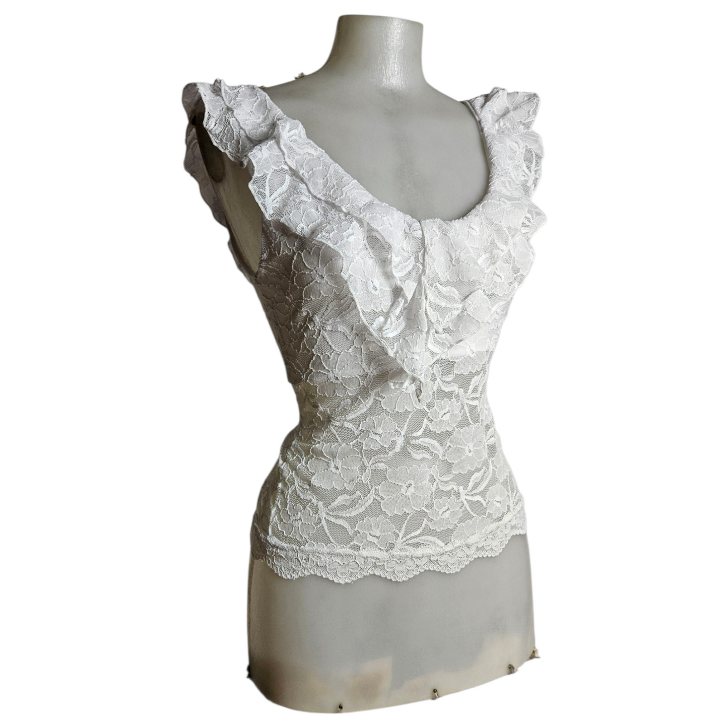 Haut en dentelle blanche à volants