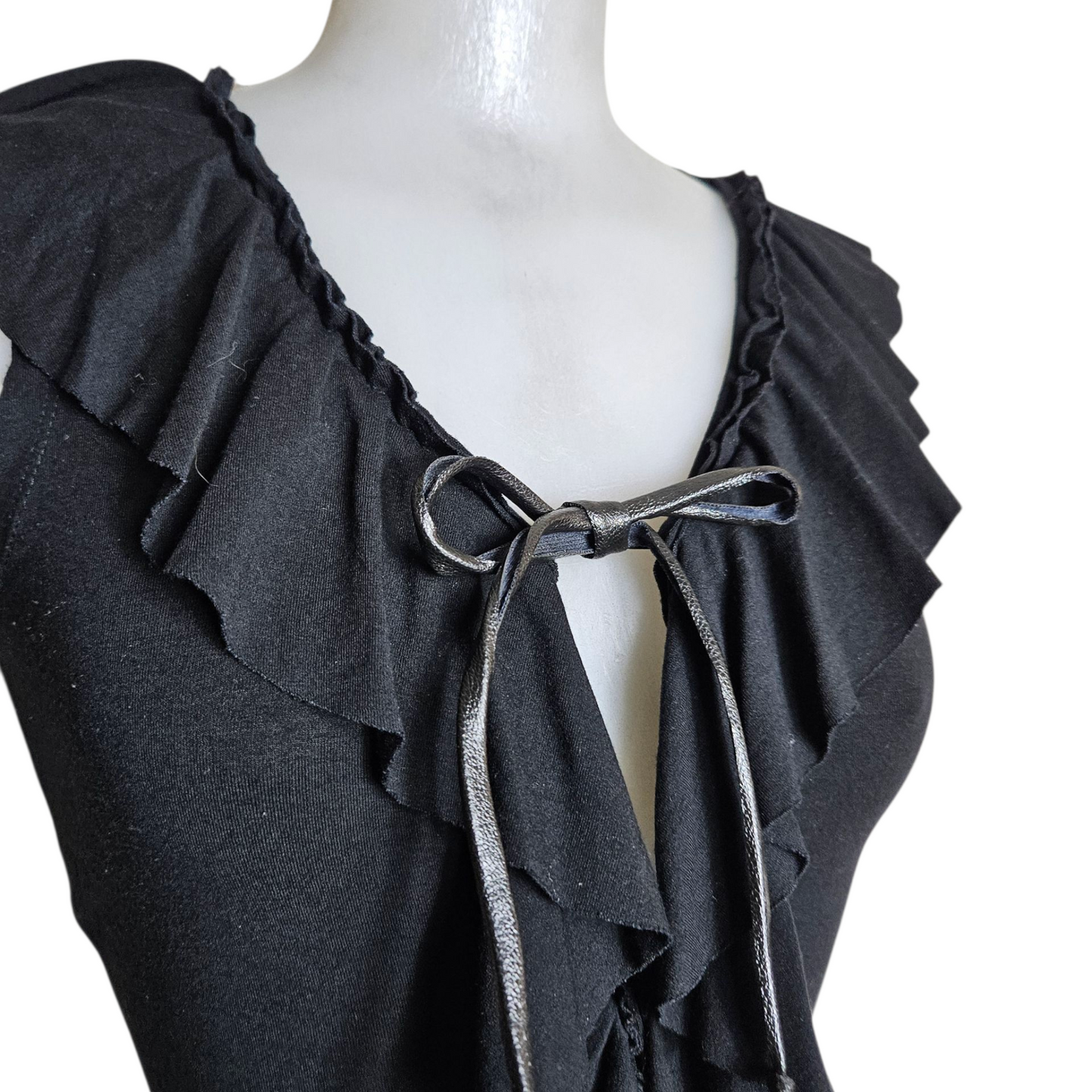 Black top with ruffled collar
