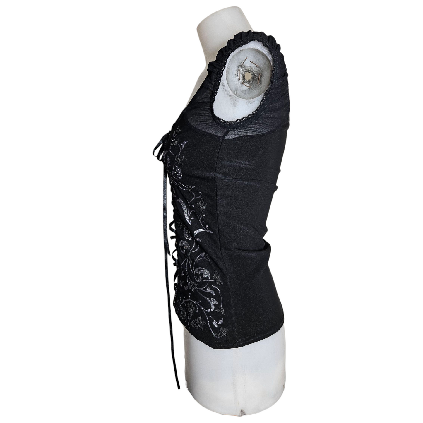 Lace-up top decorated with silver arabesques