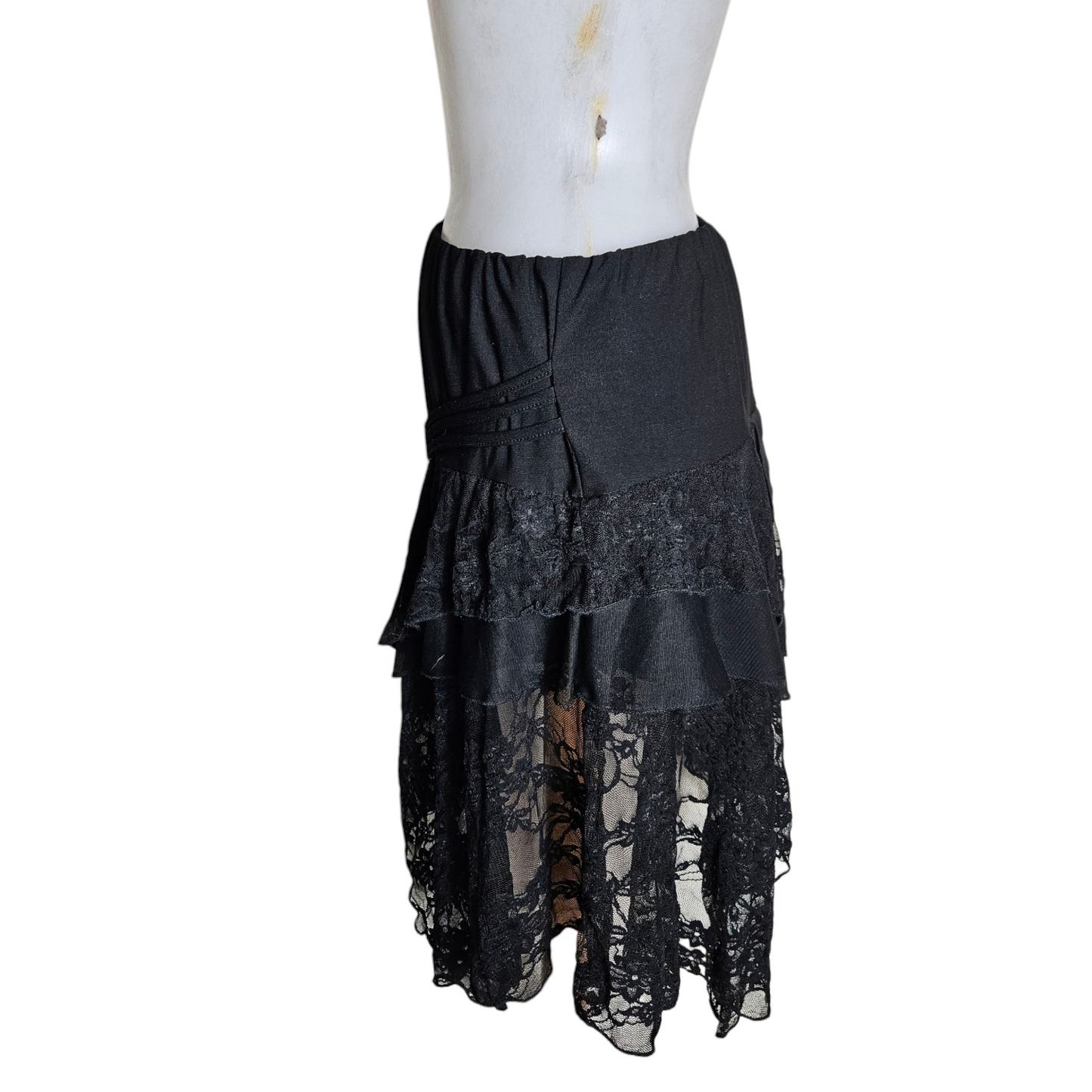 Asymmetrical lace skirt with chain details