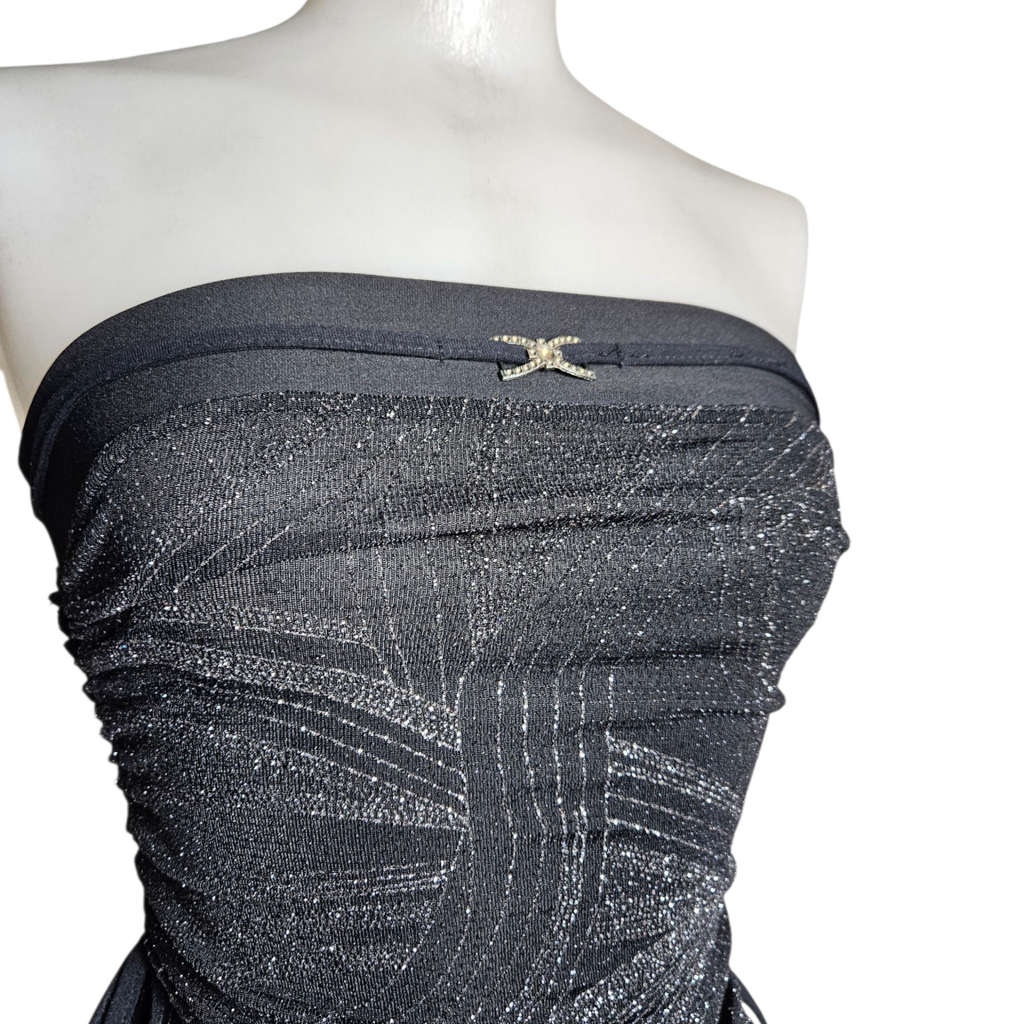 Asymmetrical strapless top with silver rhinestones