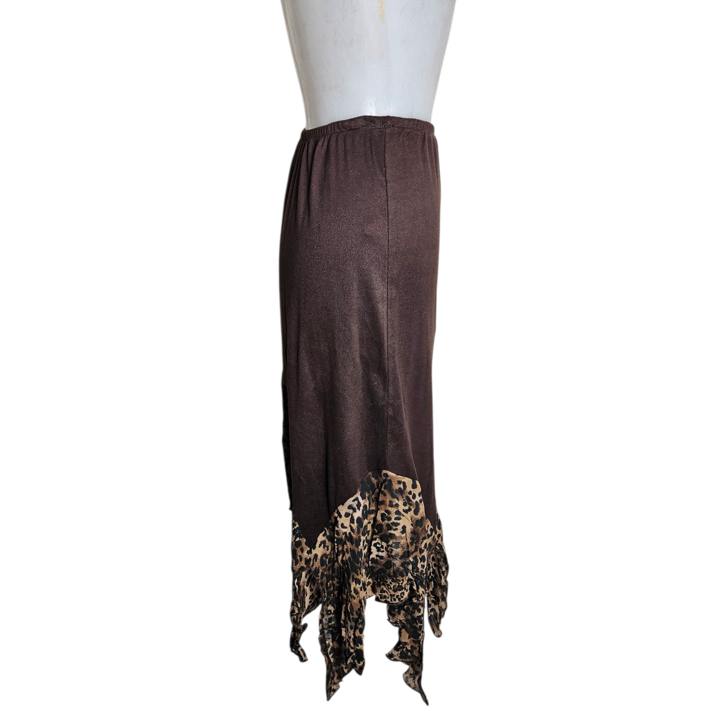 Jupe asymétrique détails voile léopard