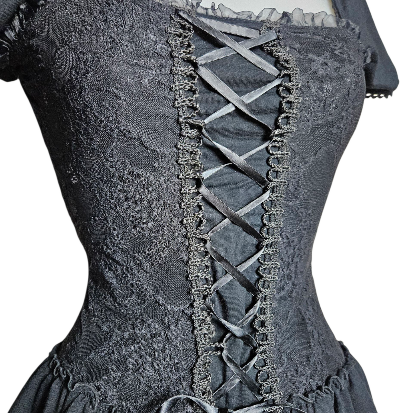 Corset-style top with lace and lacing