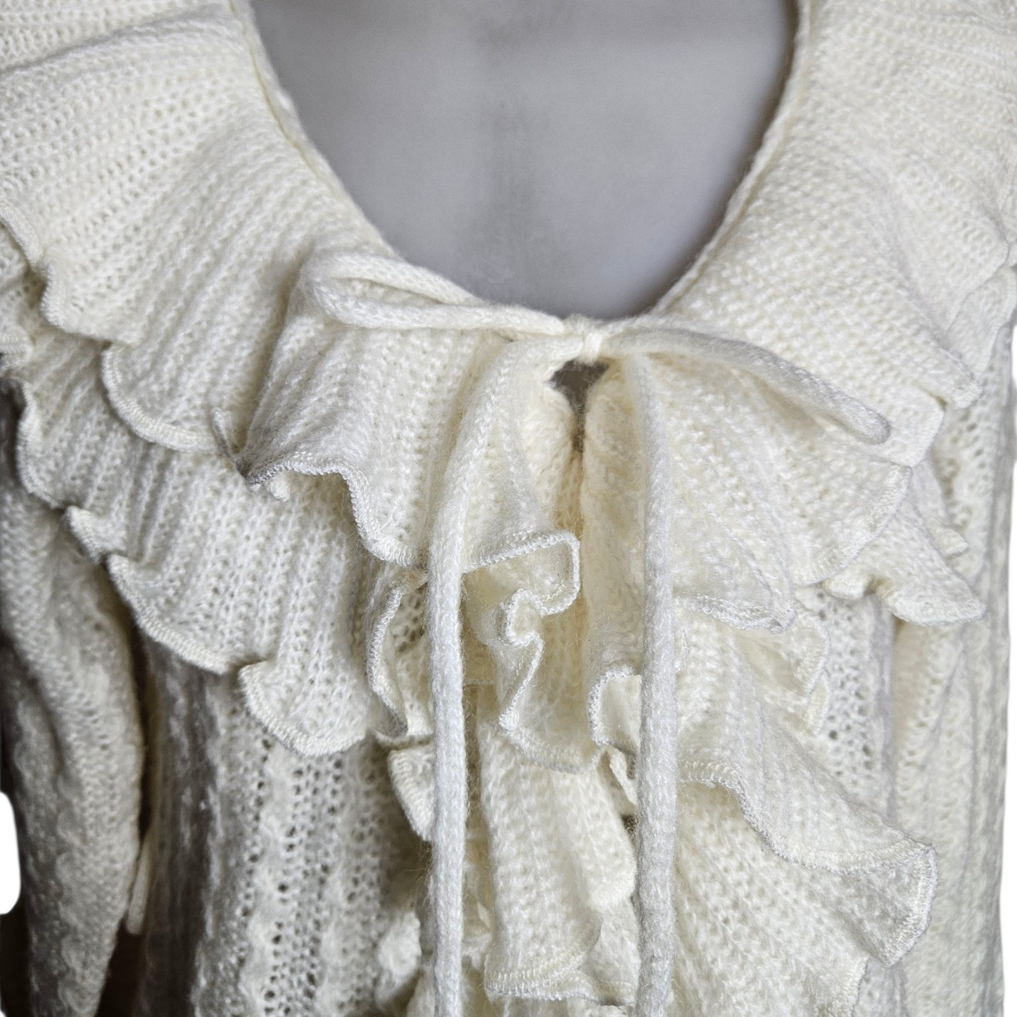 Cream ruffled cardigan