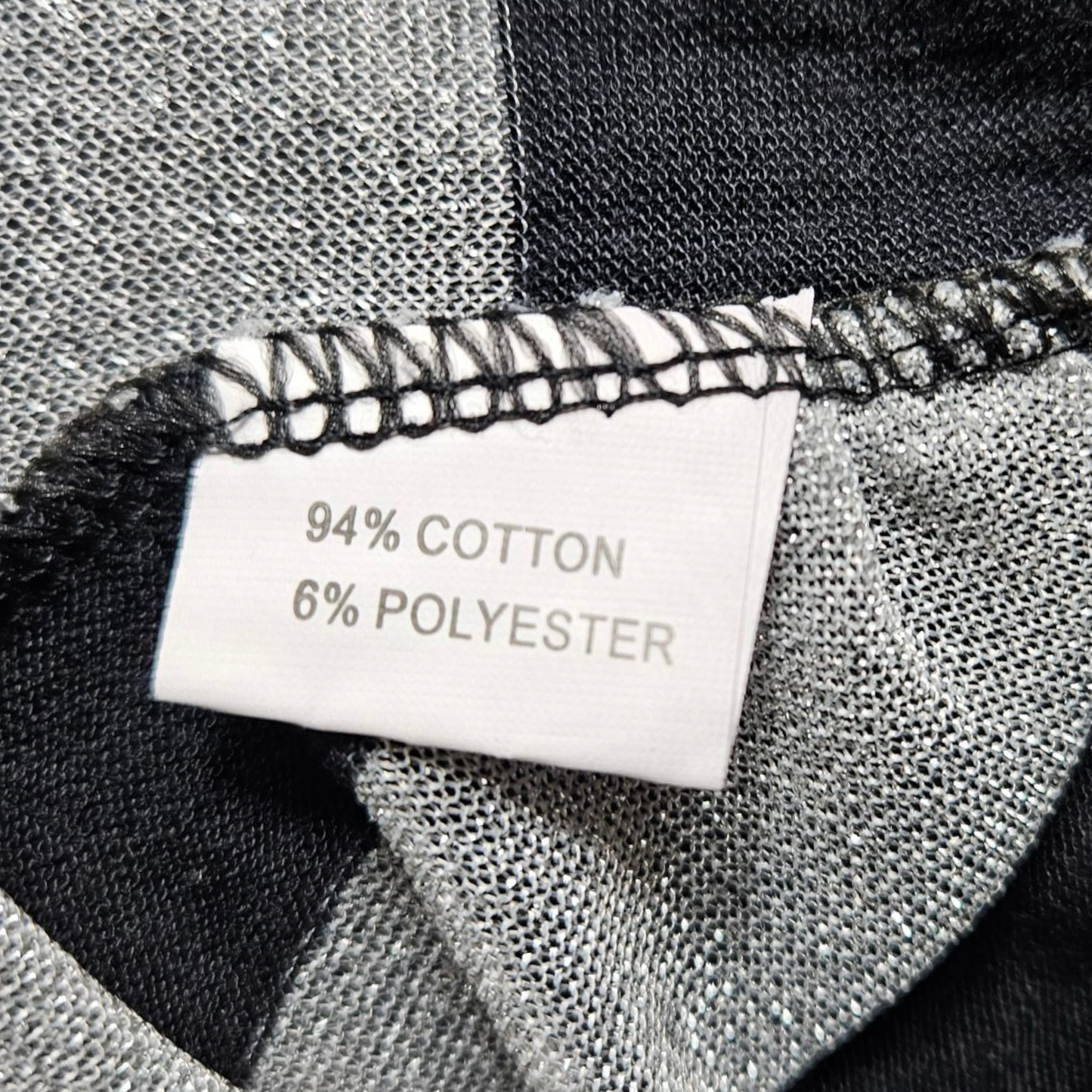 Striped top with buckle detail