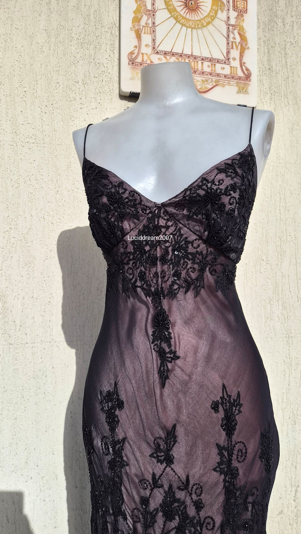 Black embroidered silk dress with pink lining