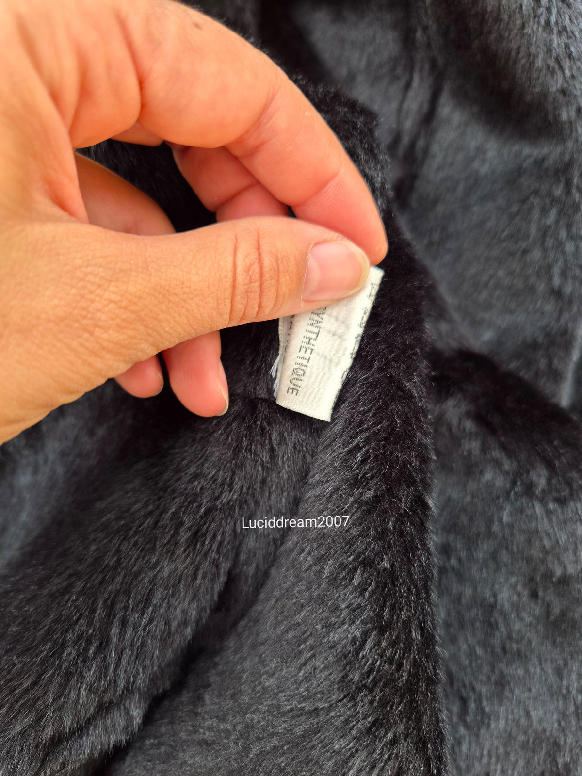 Manteau court détails fausse fourrure