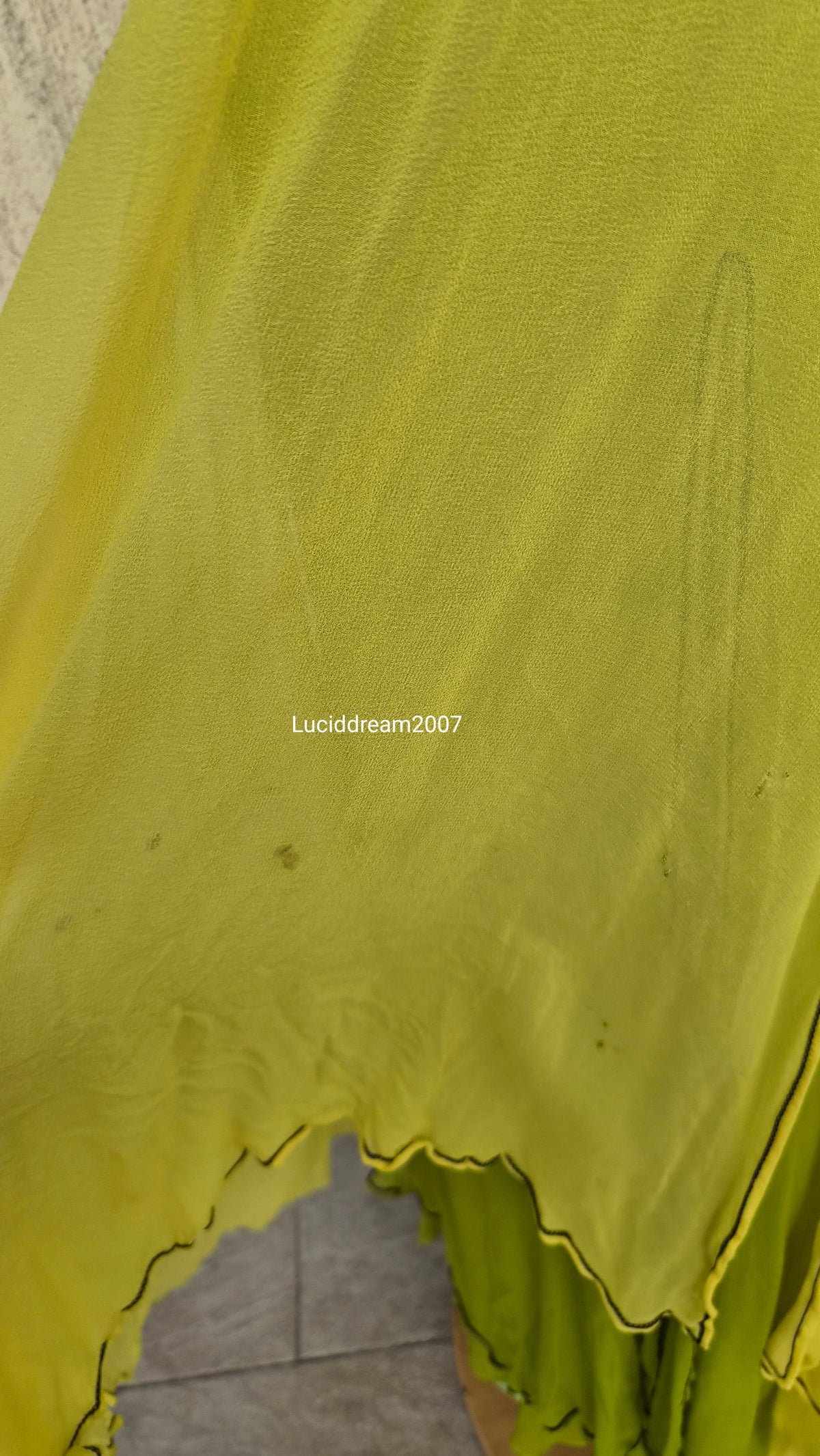 Embroidered silk dress in green tones