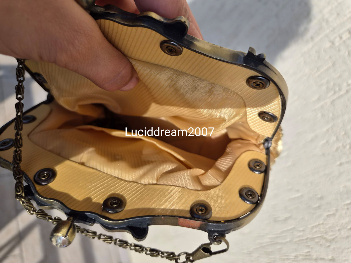 Embroidered gold bag