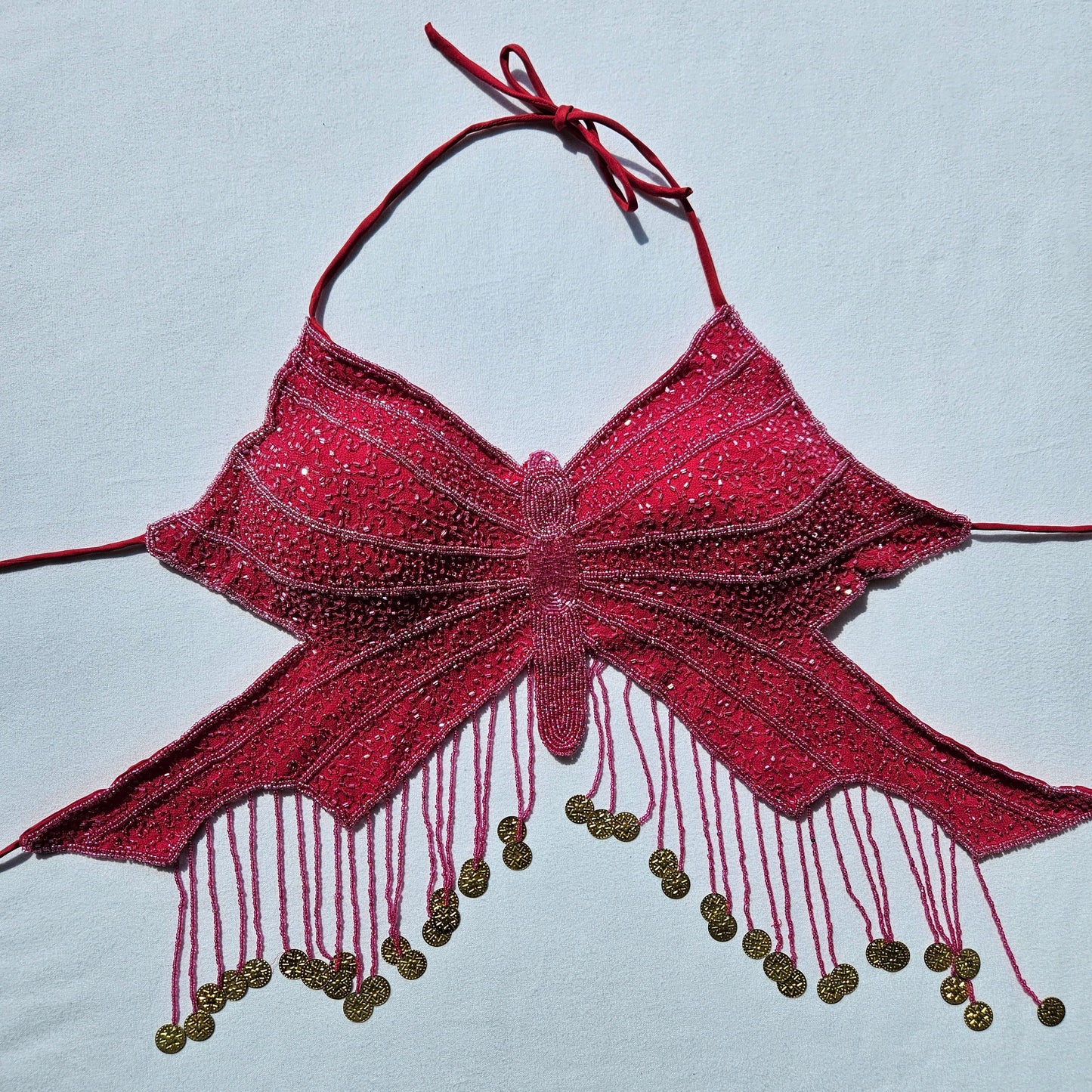 Dos nu papillon rose brodé de perles