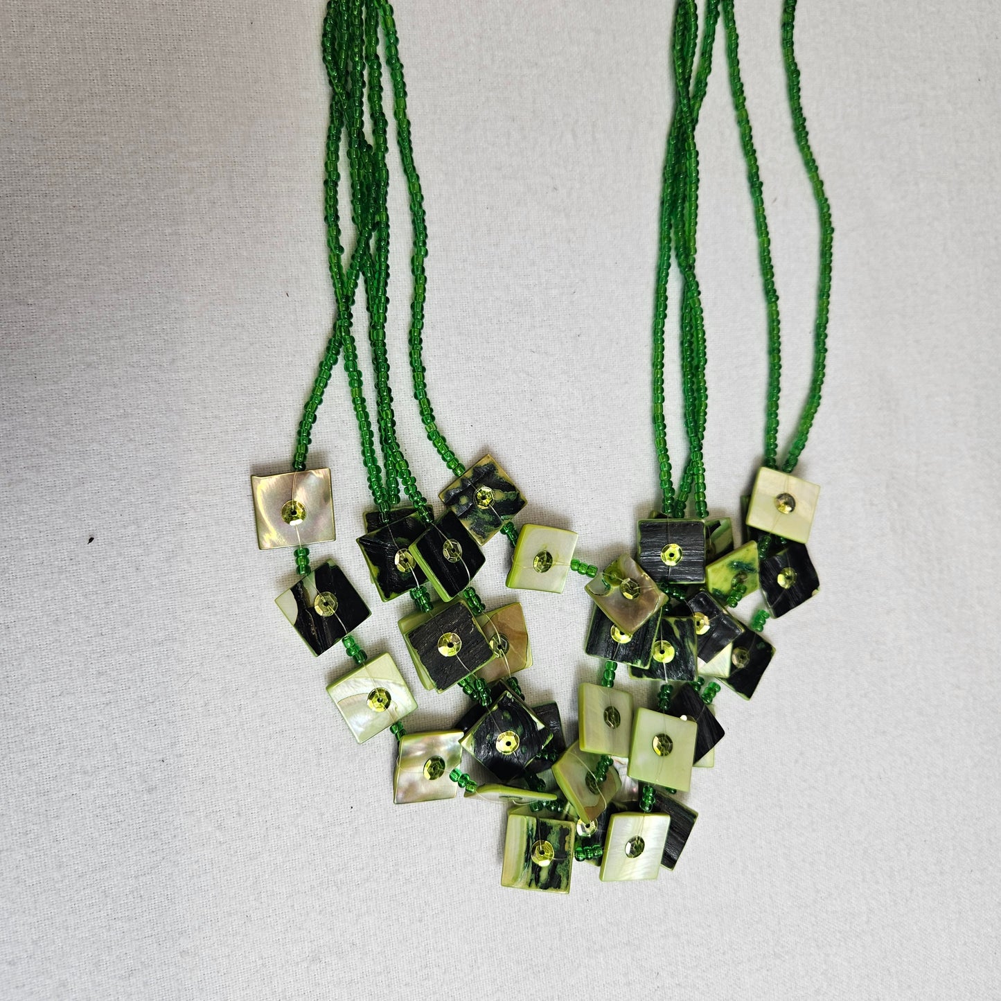 Green multi-row necklace