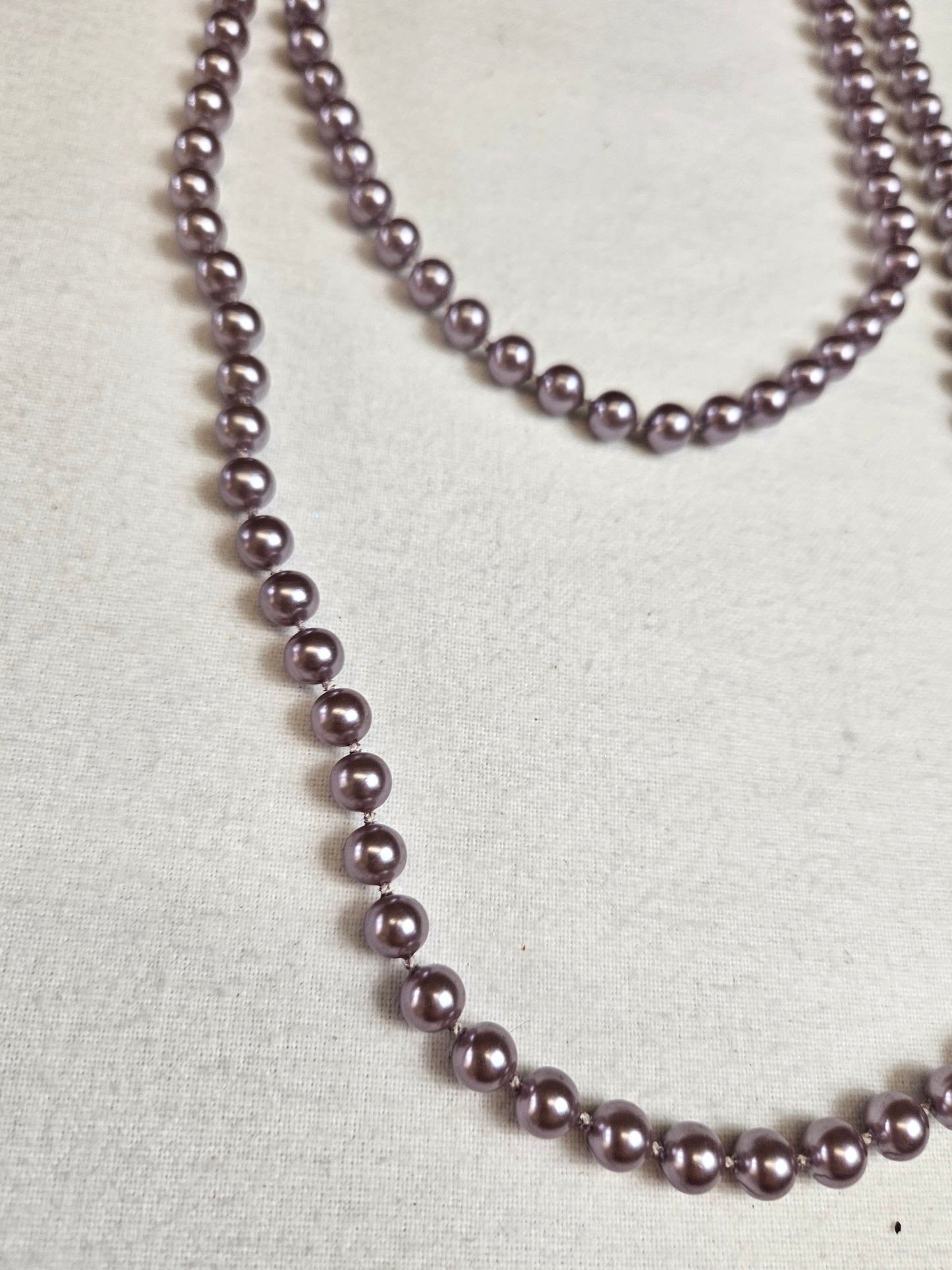 Collier de perles lilas