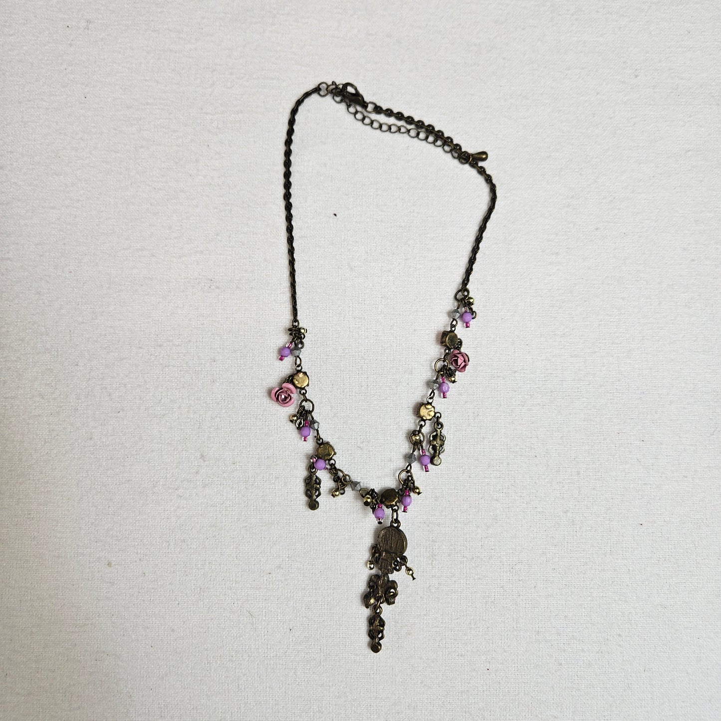 Collier breloques fleurs