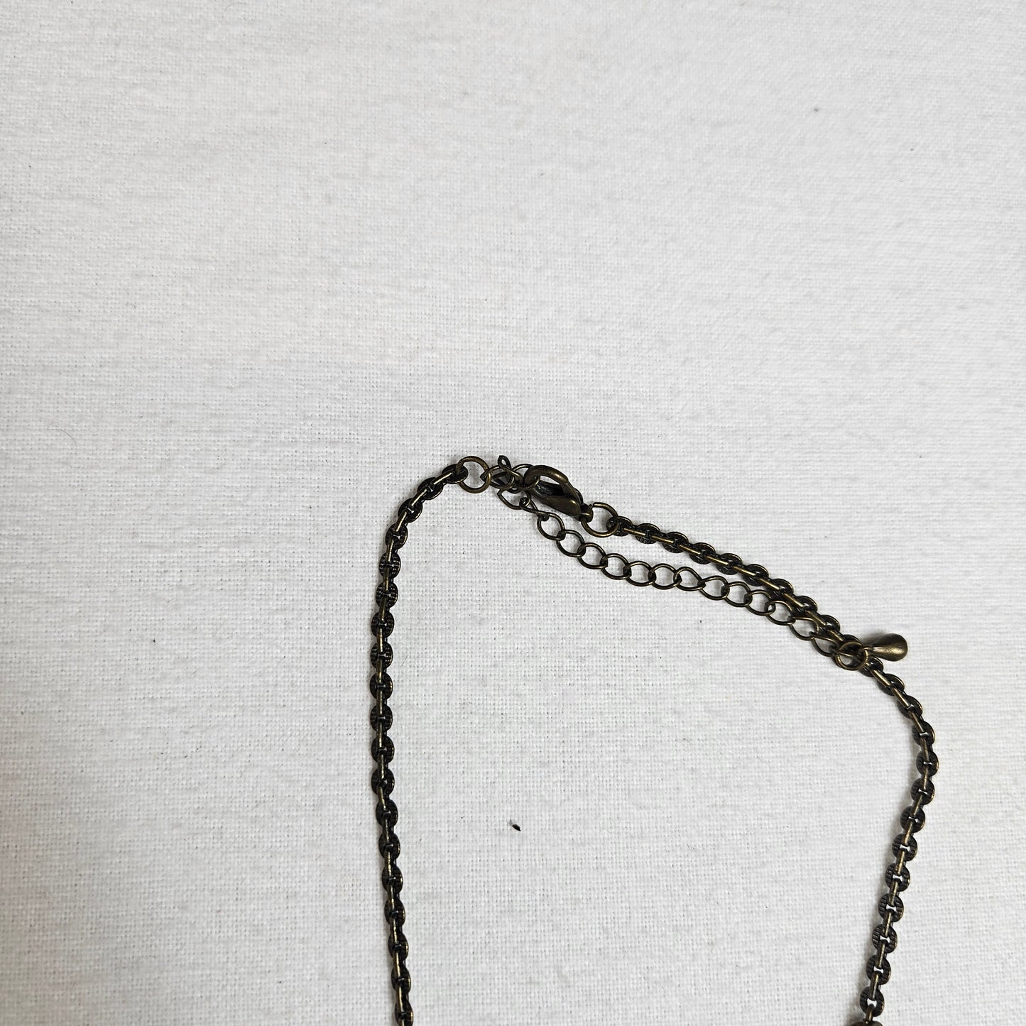 Collier breloques fleurs