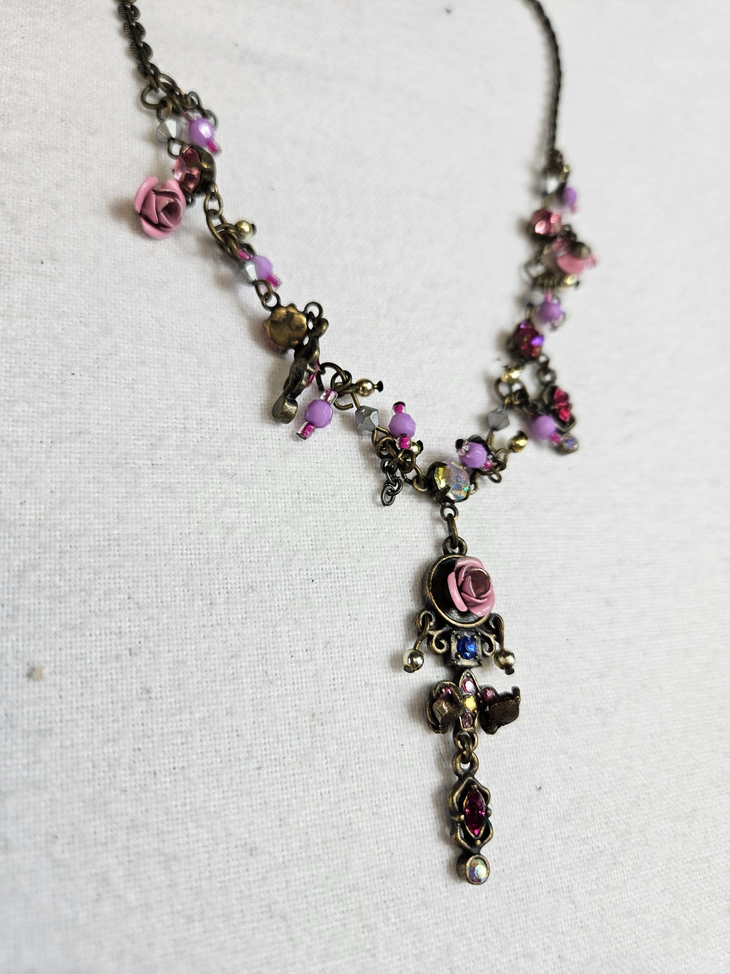 Collier breloques fleurs