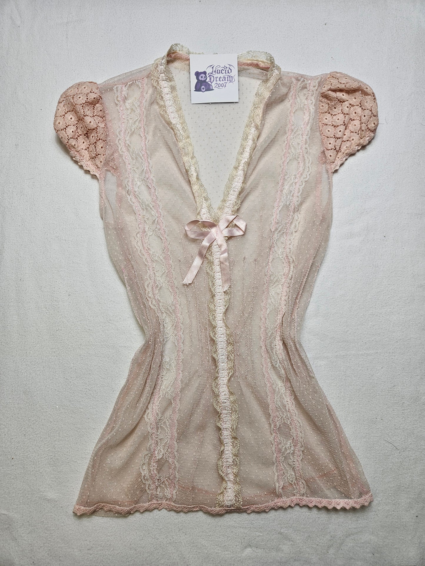 Haut en voile et dentelle rose poudré