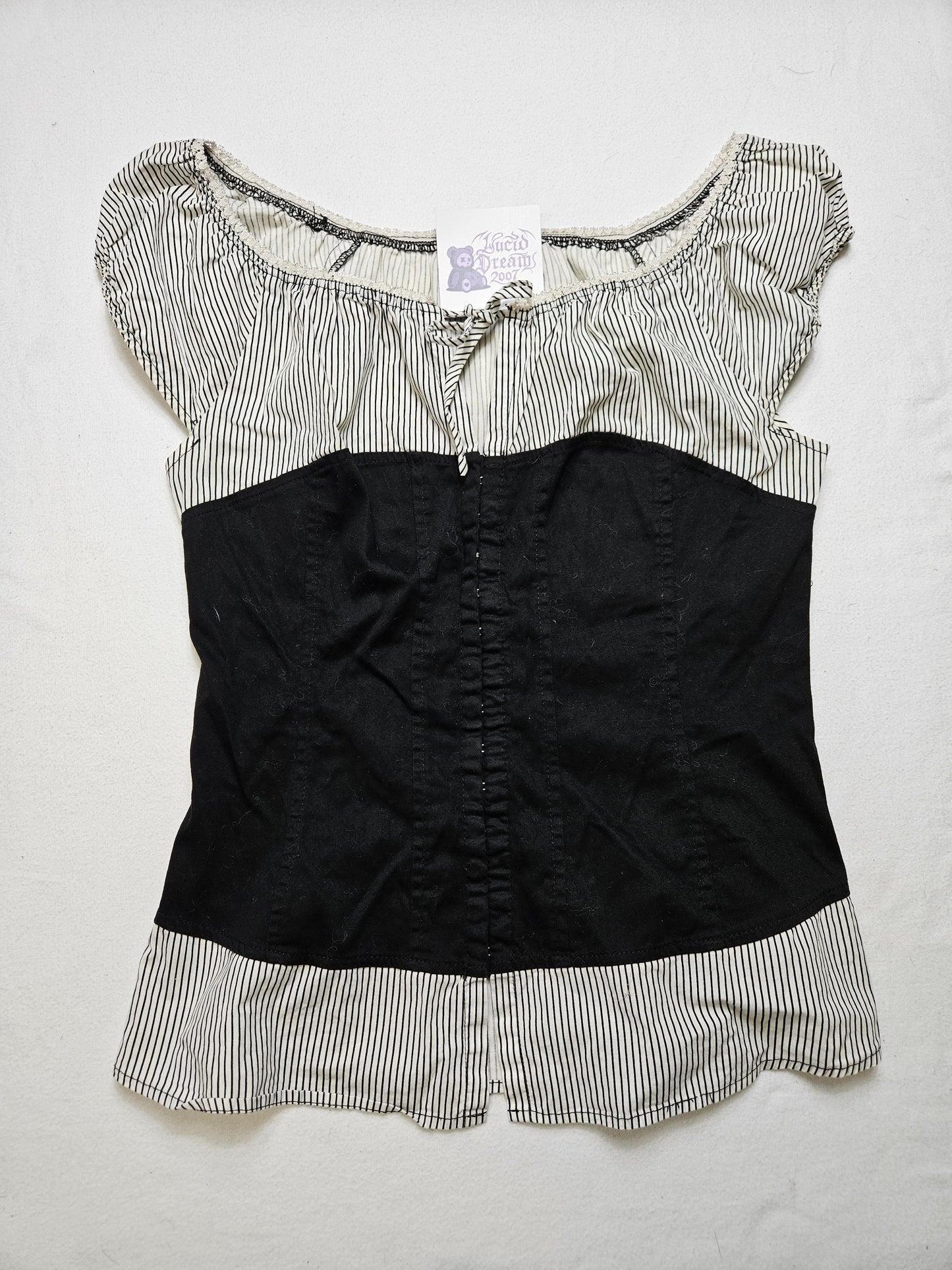 Haut effet superposition fermeture agrafes