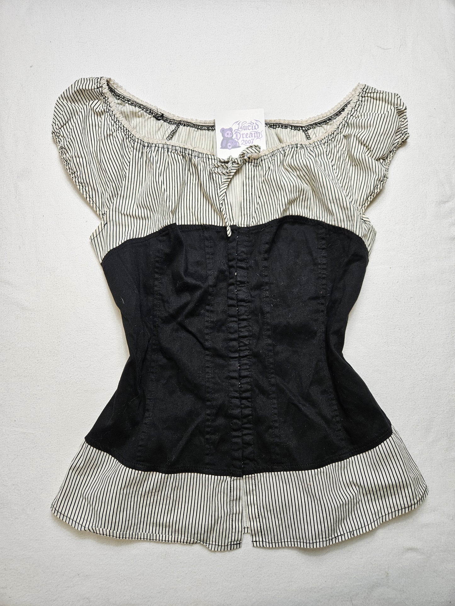 Haut effet superposition fermeture agrafes