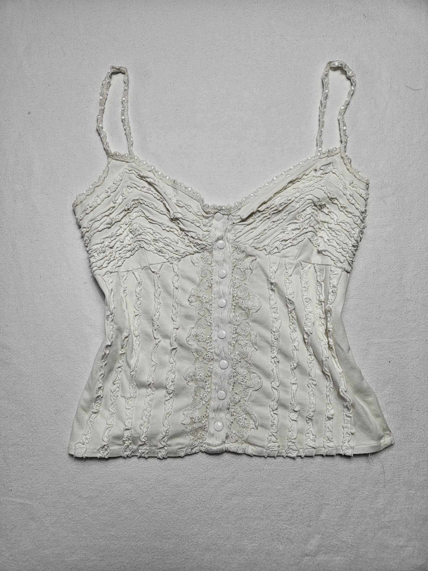 Haut blanc détails volants et boutonnage