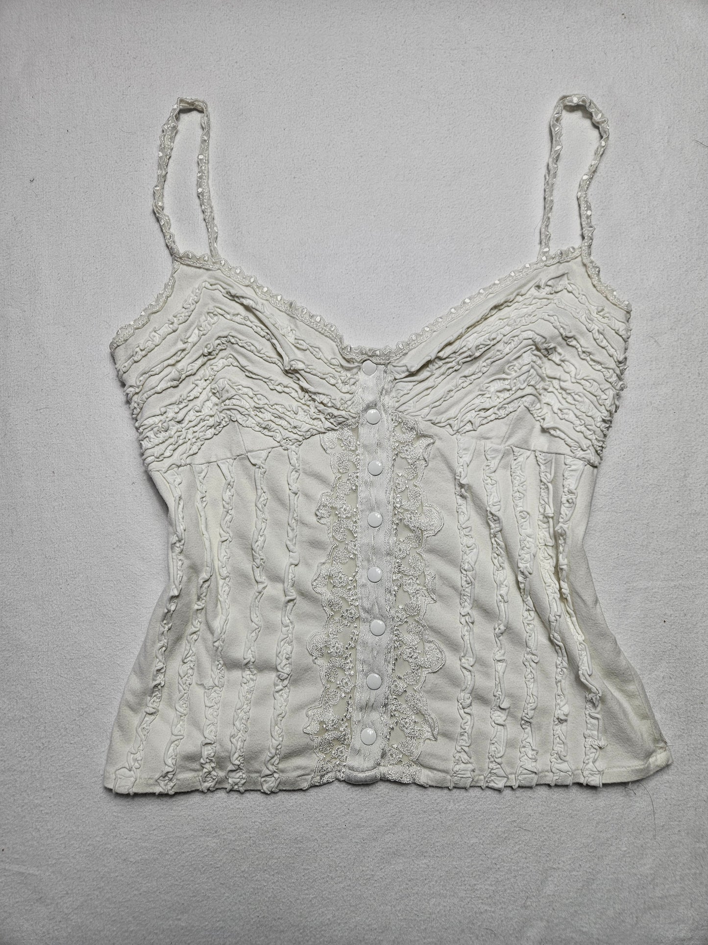 Haut blanc détails volants et boutonnage