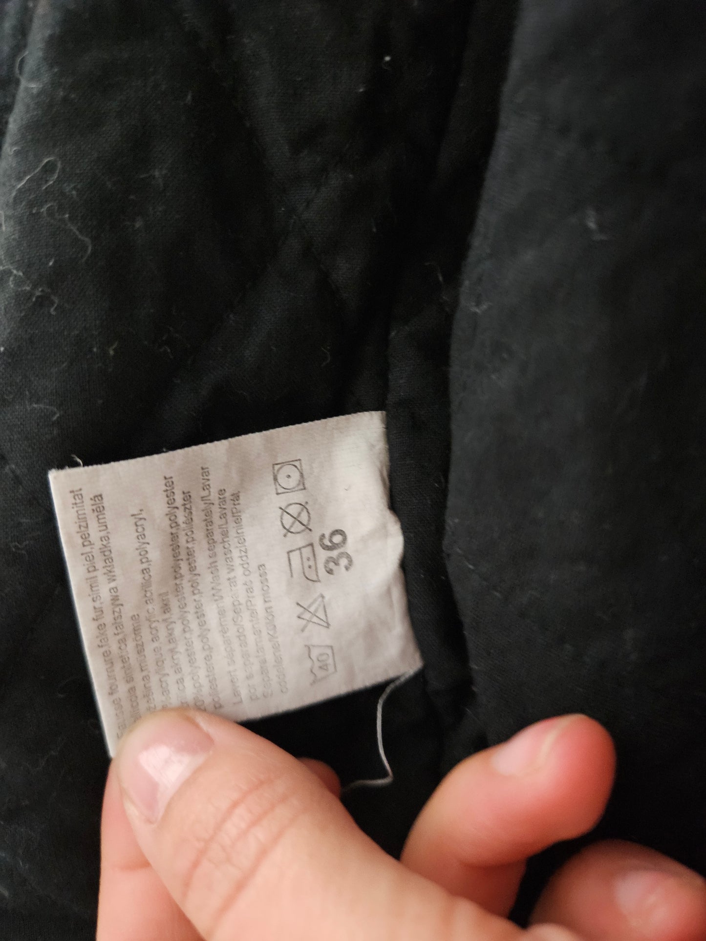 Manteau en denim col fausse fourrure