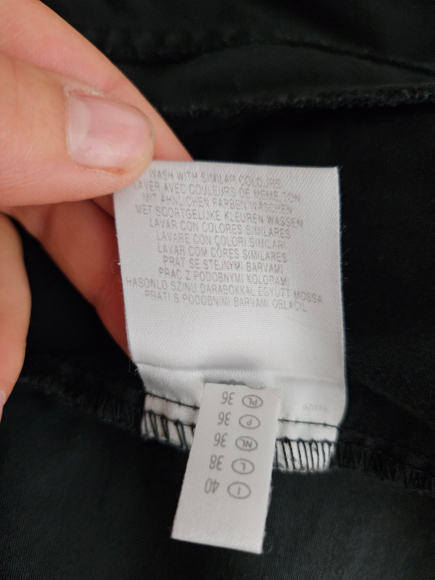 Chemise cintrée noire fermeture par agrafes