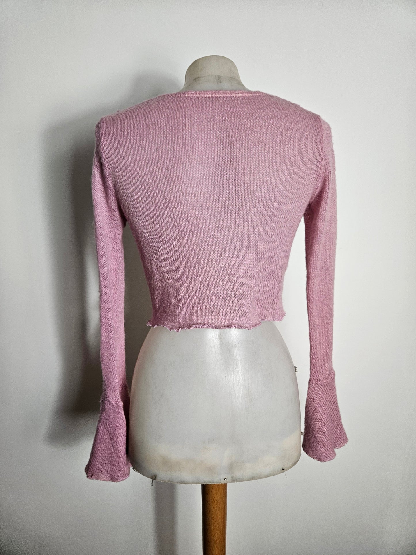 Boléro à volants rose poudré