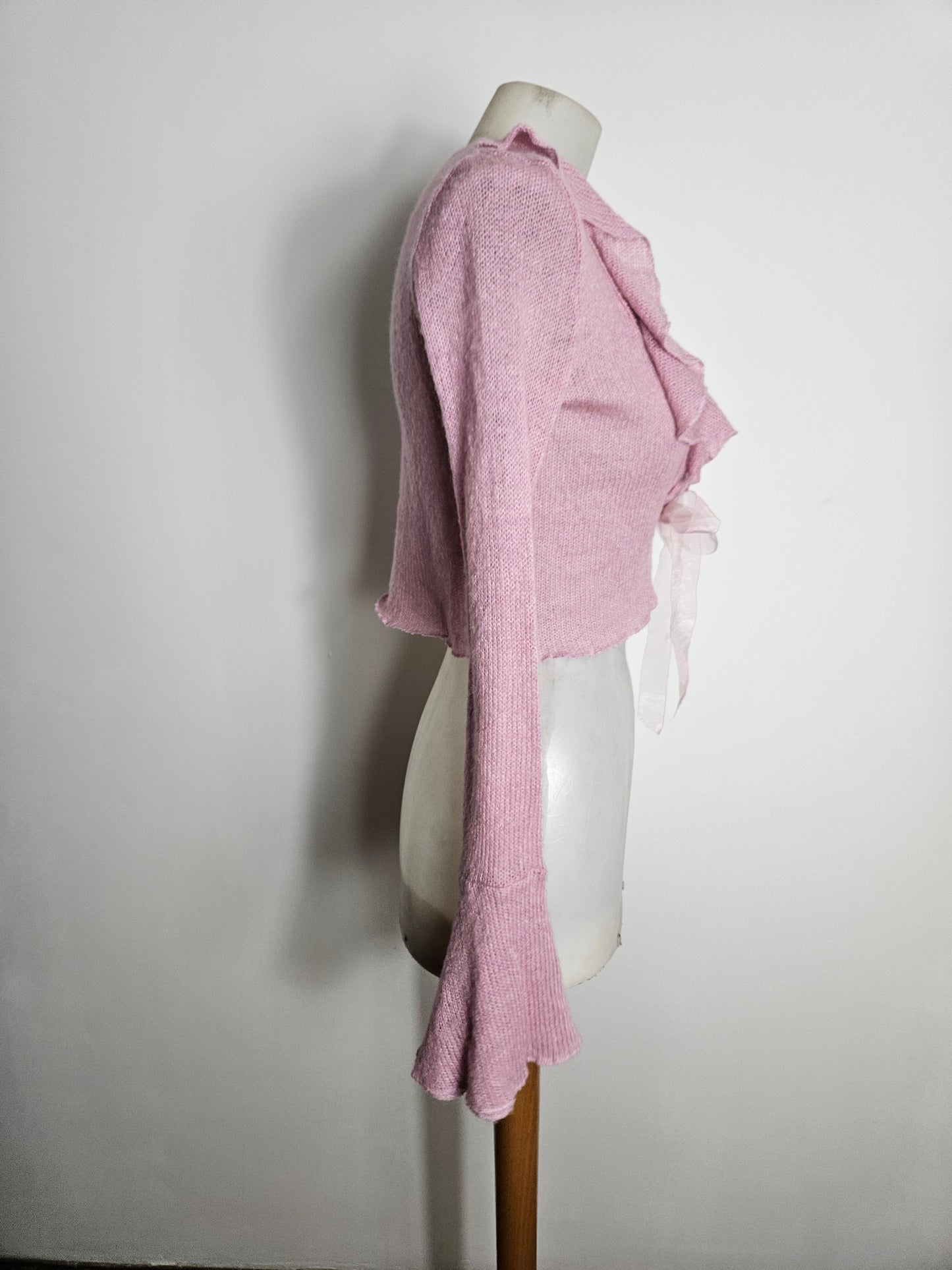 Boléro à volants rose poudré
