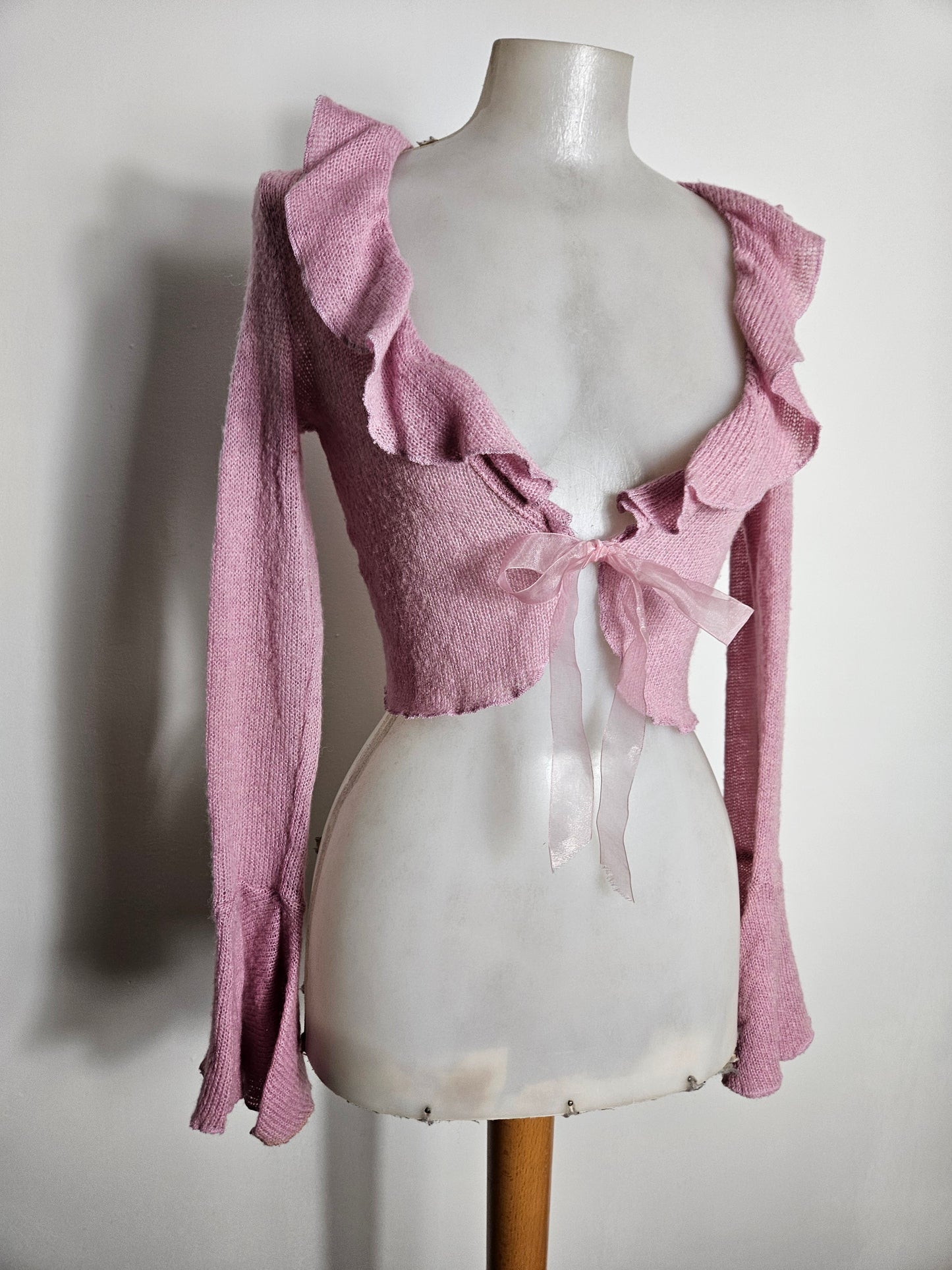 Boléro à volants rose poudré