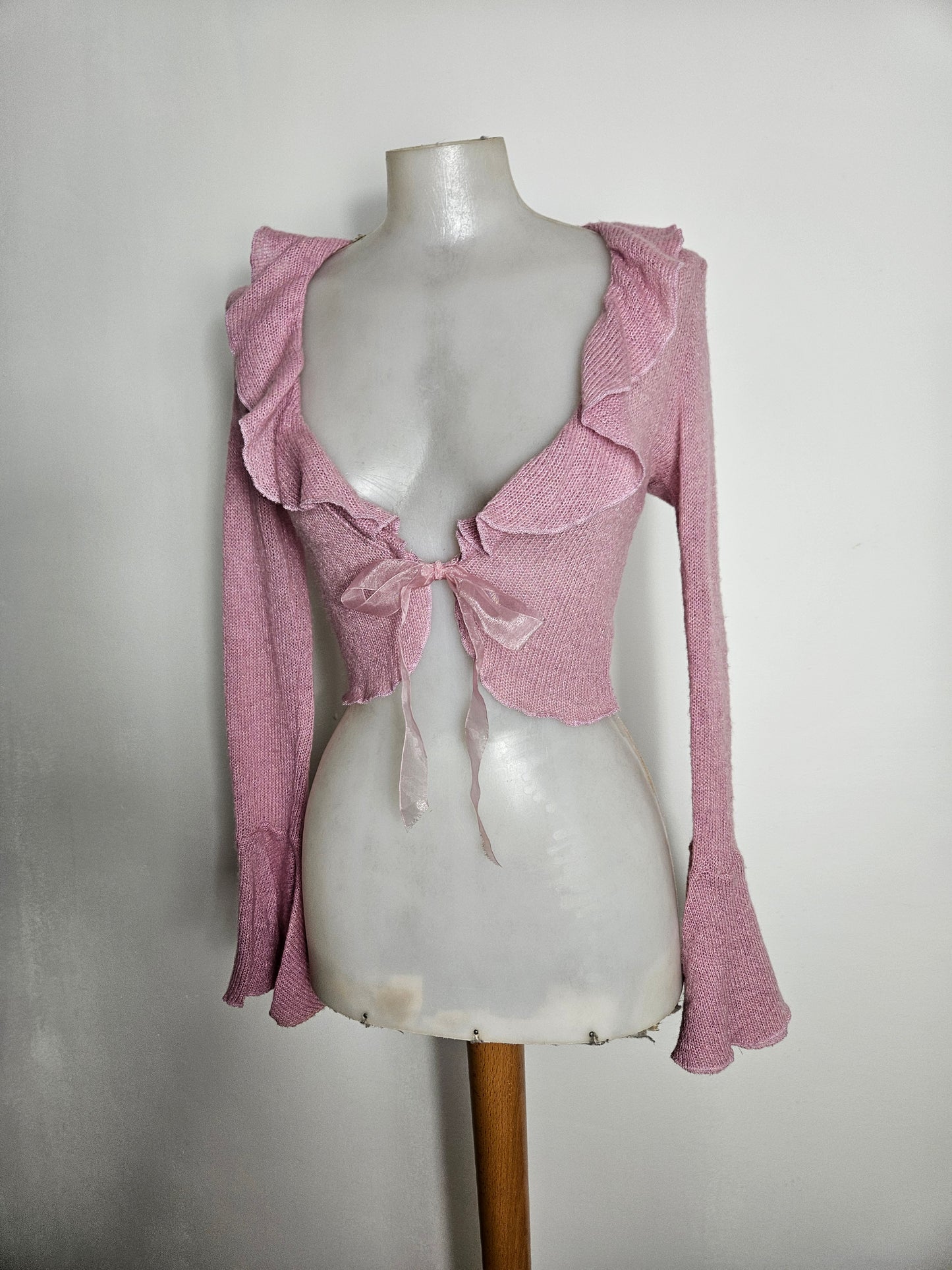 Boléro à volants rose poudré