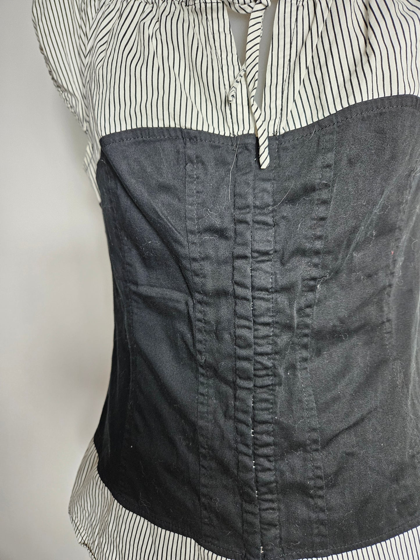 Haut effet superposition fermeture agrafes