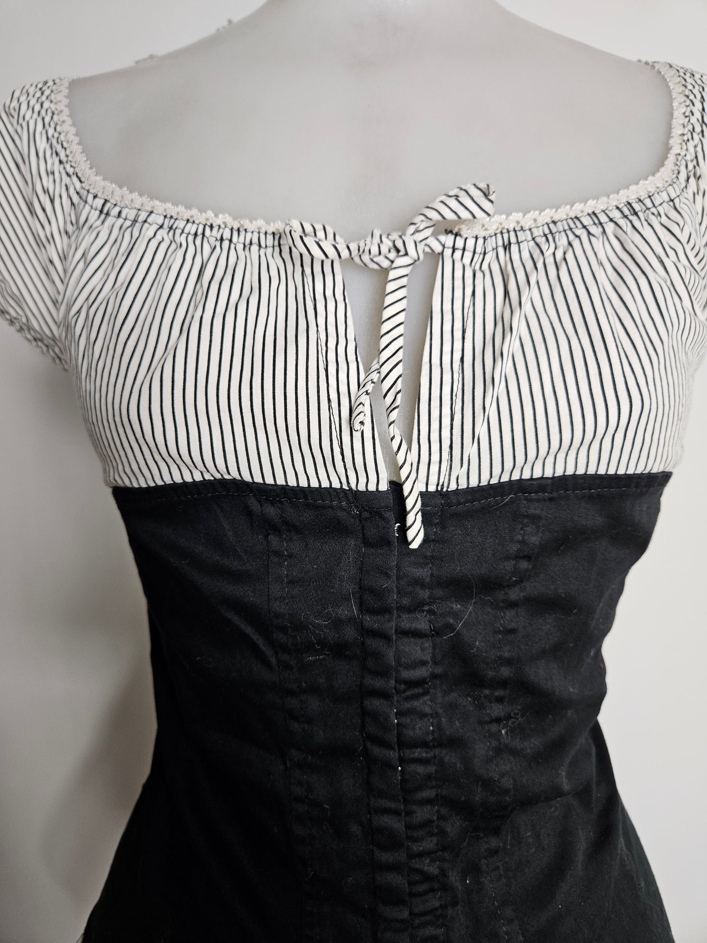 Haut effet superposition fermeture agrafes